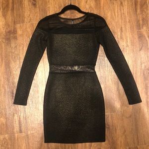 Black mini dress with sheer cutout